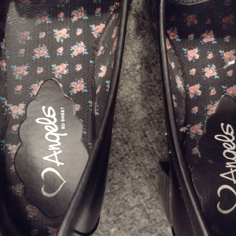 Black Platform Slip-On Shoes with Playful Pattern